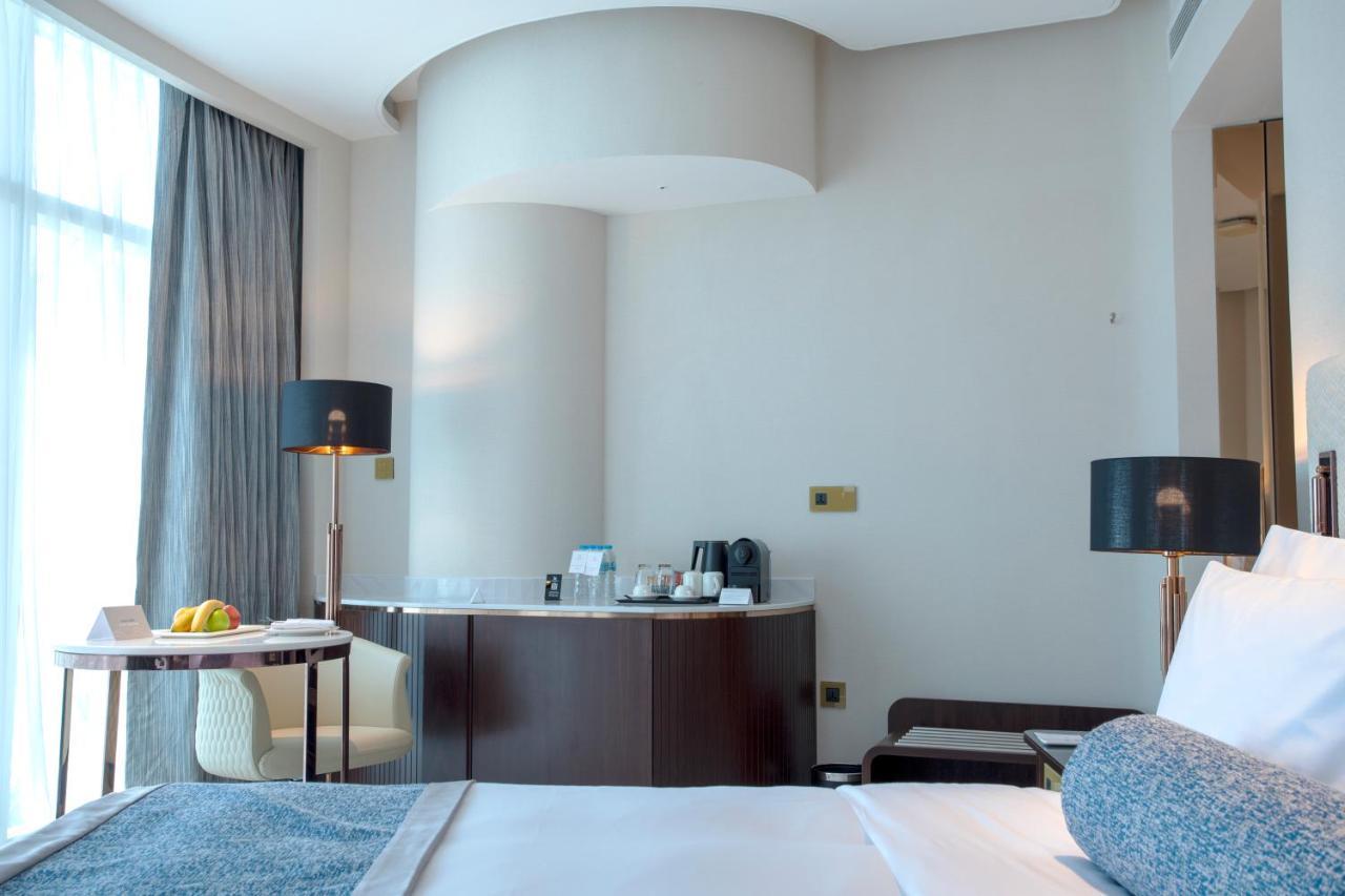 Century Marina Hotel - Lusail 외부 사진 A room at the hotel